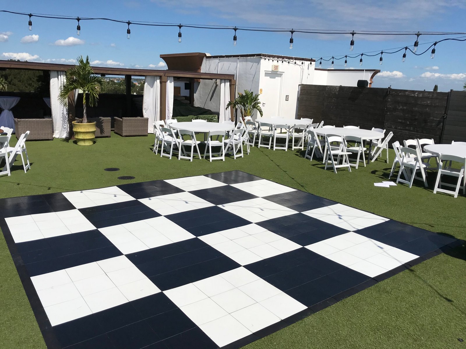 checkered dance floor OUTDOOR lawn white chairs