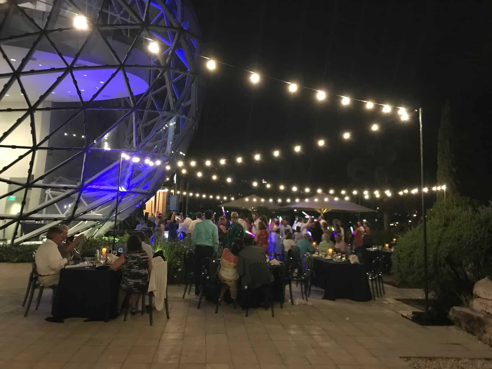 string lights patio night palms