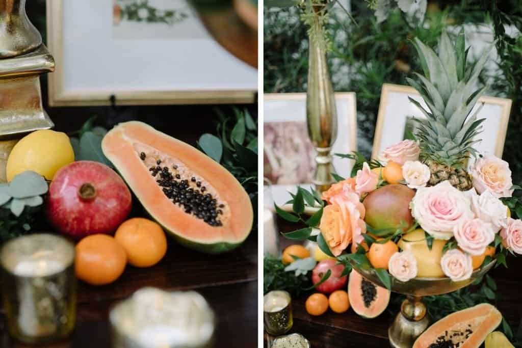 Whimsical Table Styling with Fresh Pomegranates Papayas Lemons and Roses by Bruce Wayne Florals and Gabro Event Services