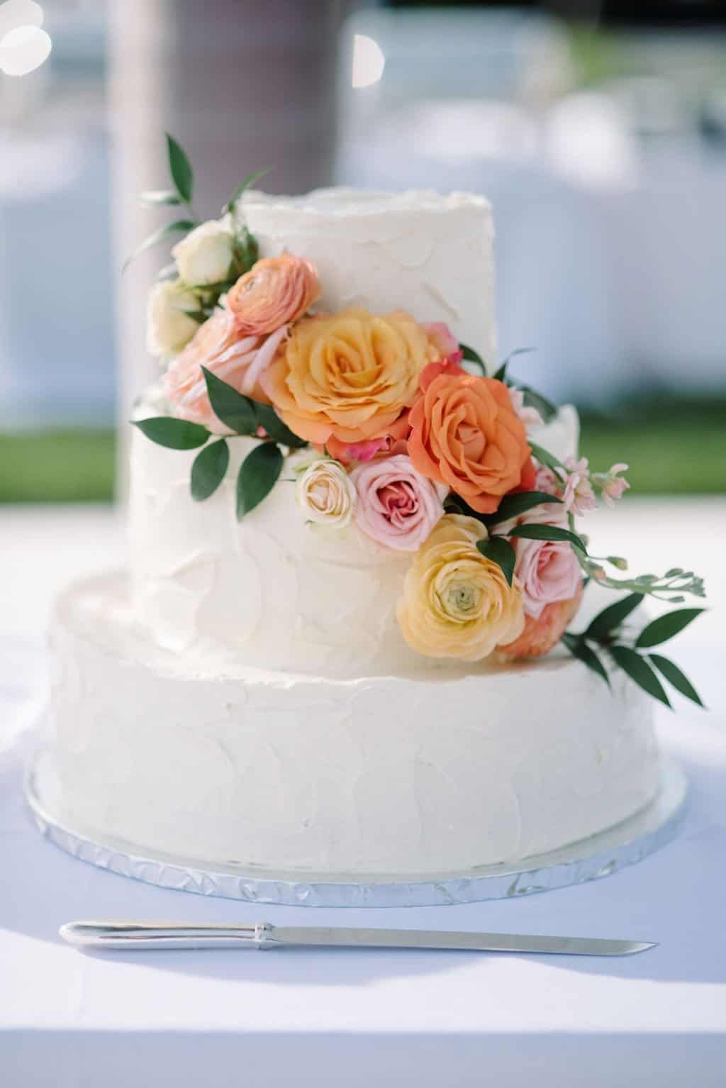 Two Tier Textured Buttercream Wedding Cake by Cassis Bakery with Fresh Blush Peonies and Garden Roses