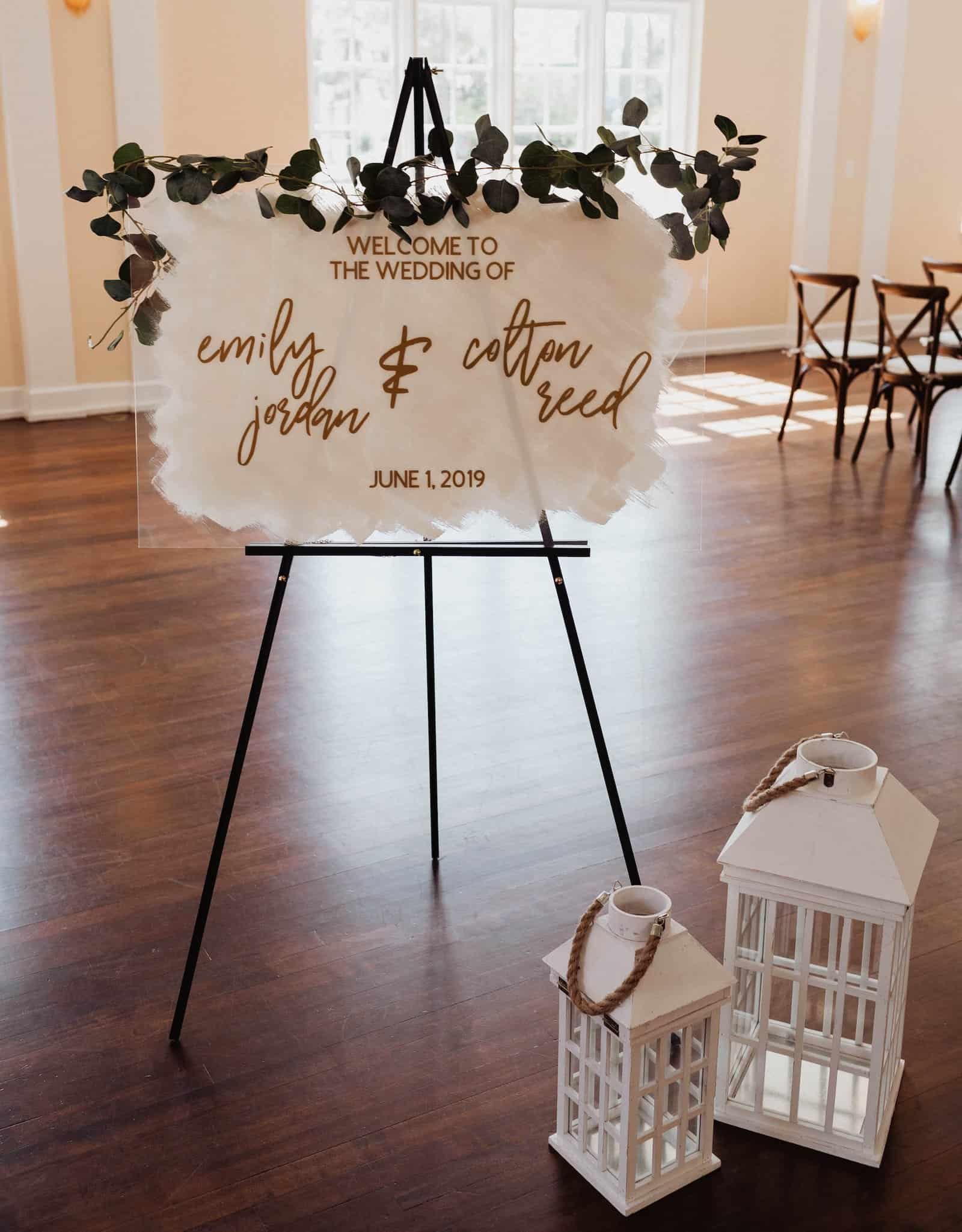 Elegant wedding reception ballroom at The Birchwood featuring custom wall draping and romantic ambient lighting by Gabro Event Services