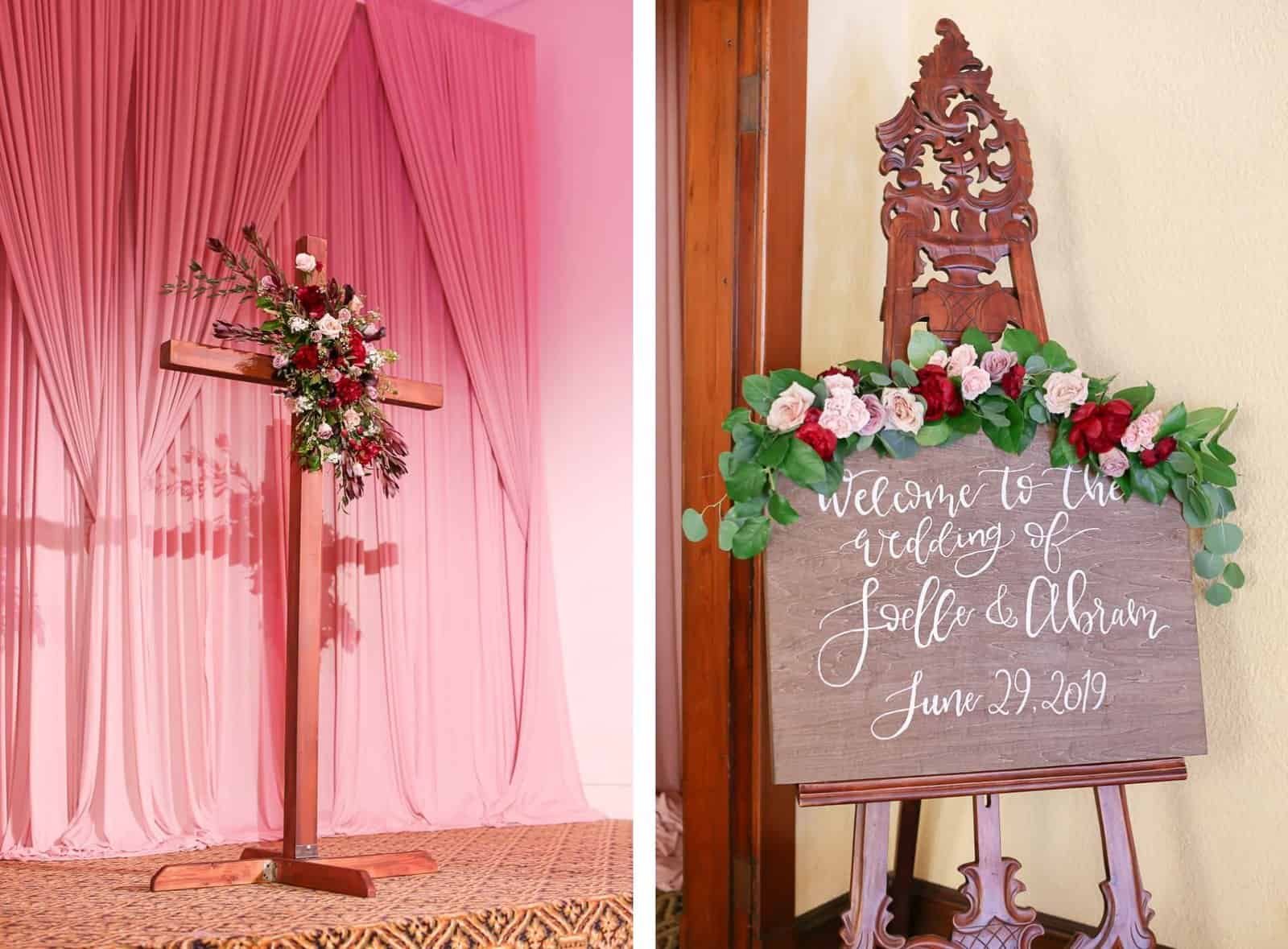Romantic wedding ceremony decor with wooden cross and Gabro Event Services dusty rose backdrop draping