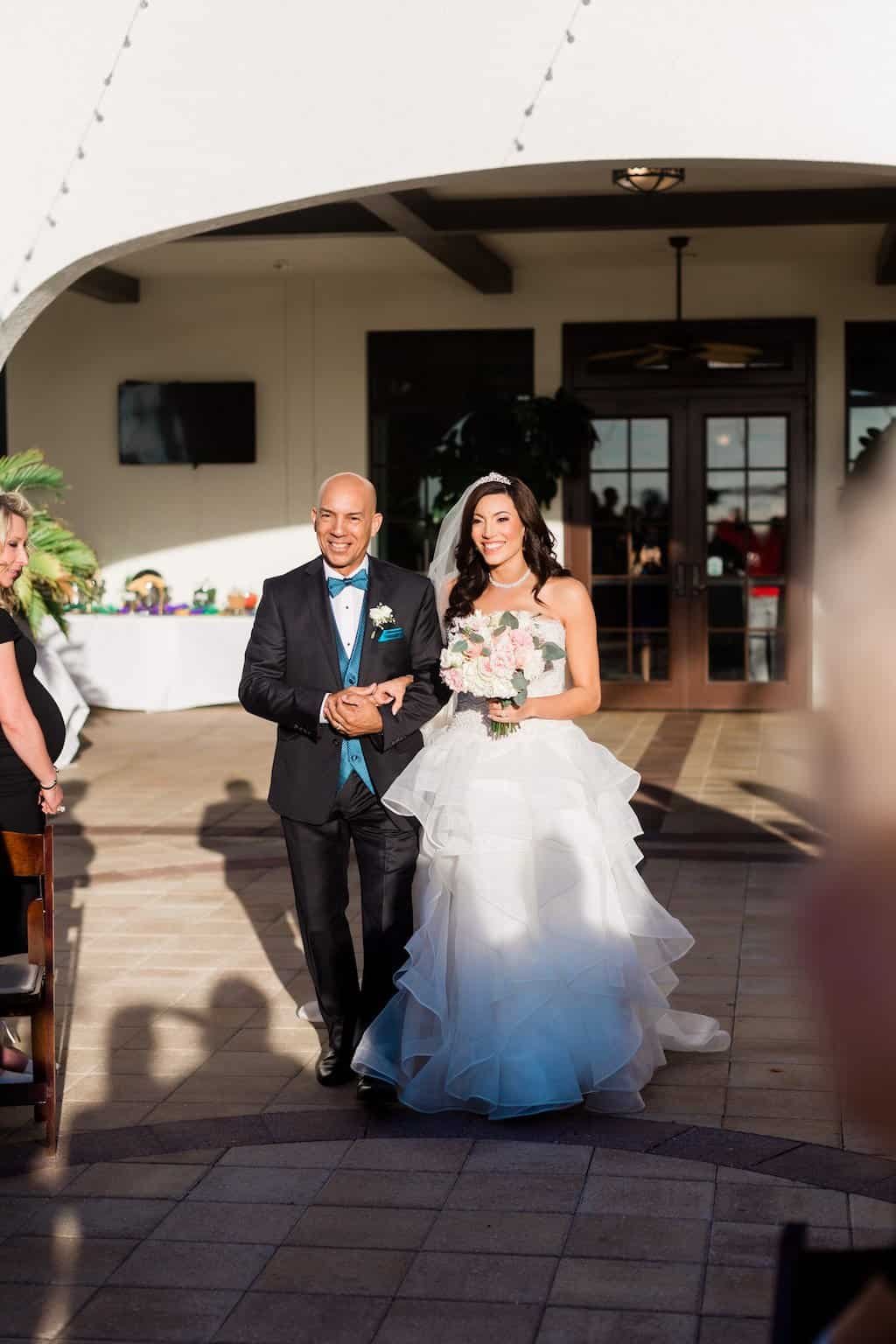 Lush Rustic Barn Reception Decor with Flowing Greenery Garlands and Cross-Back Chairs by Gabro Event Services