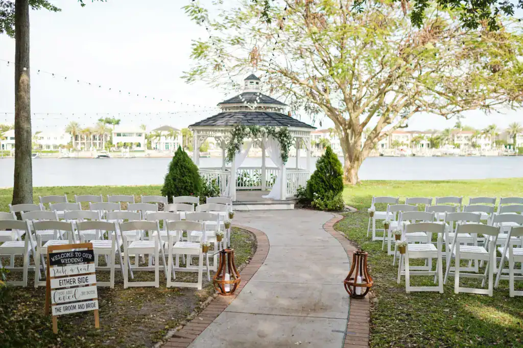 Bride and groom ceremony portrait overlooking the Tampa Bay waterfront at Davis Island Garden Club