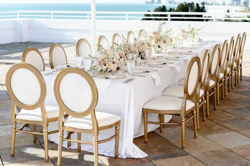 Intimate outdoor wedding ceremony setting on The Don CeSar rooftop terrace overlooking the Gulf of Mexico