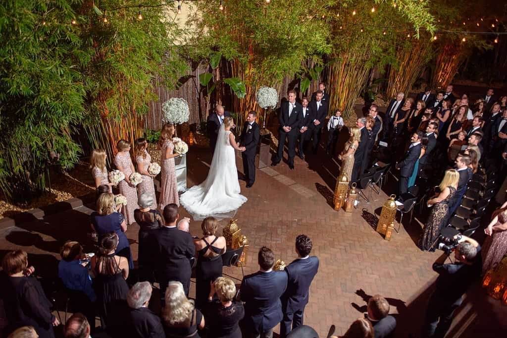 Custom monogram lighting projected onto the dance floor during a Tampa wedding reception.