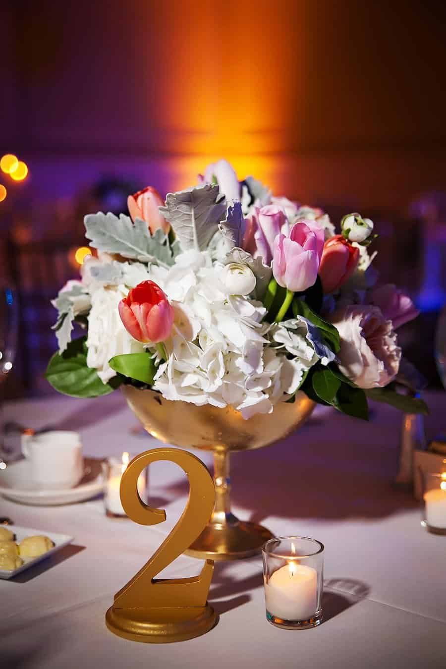 Pink and Ivory Floral Centerpiece with Mirrored Base and Gold Framed Table Numbers