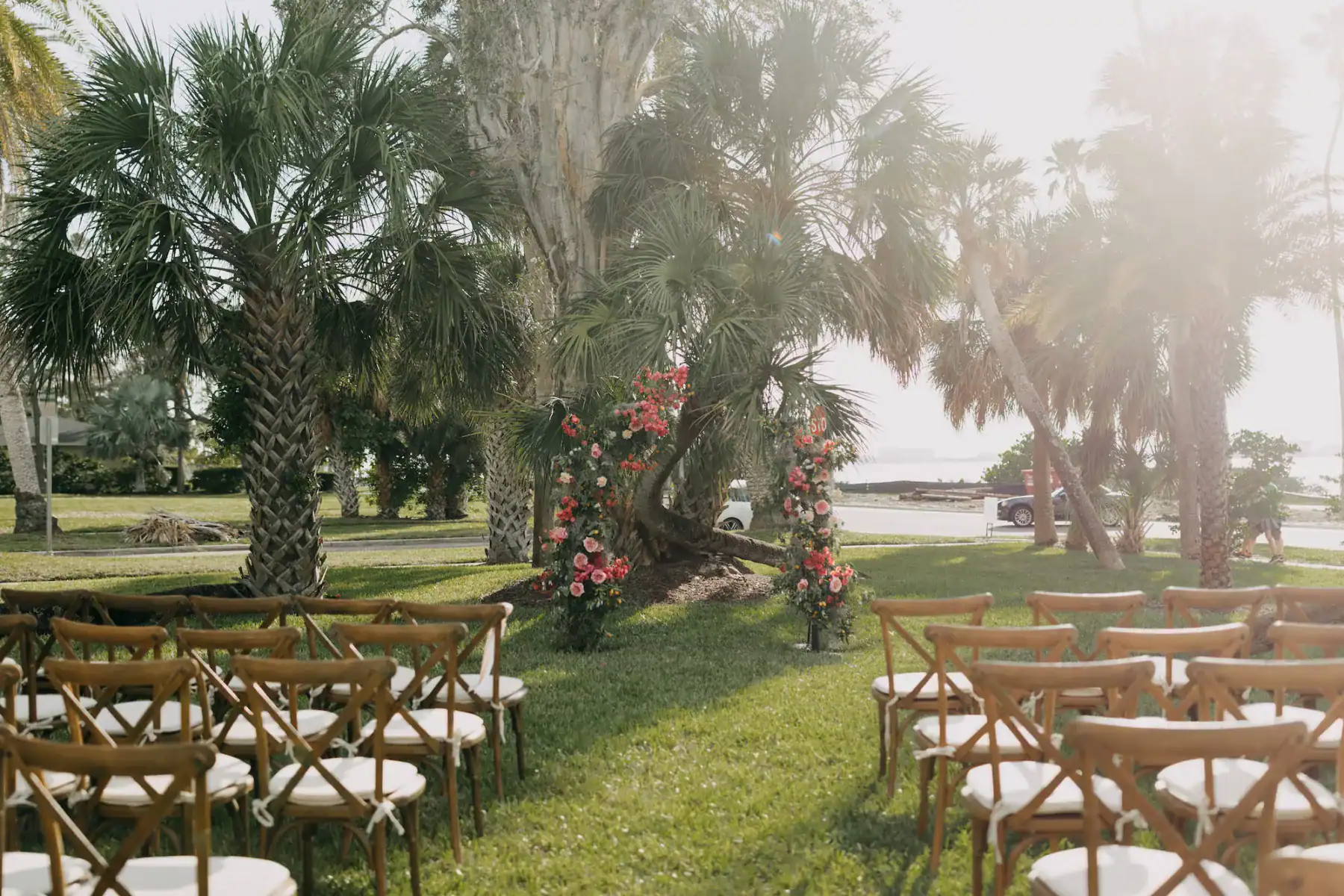 Wedding Ceremony on The Fenway Lawn with Wooden Crossback Chairs and Coastal Coordinating Design