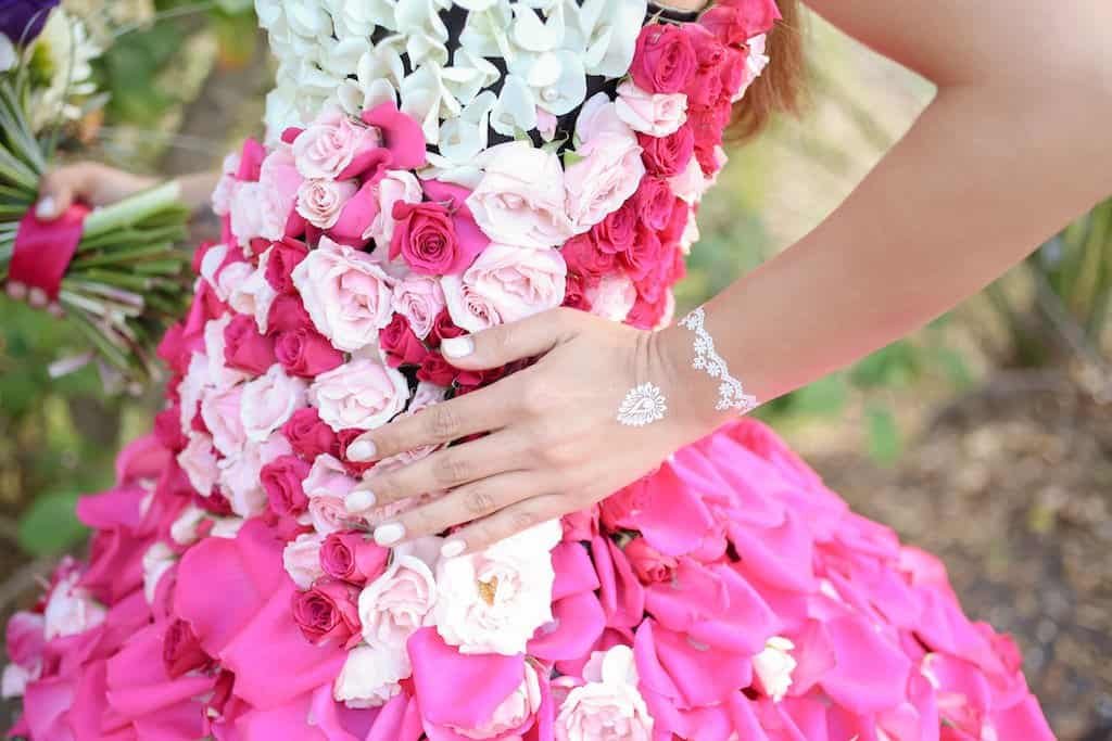 Editorial model wearing an exquisite custom strapless fresh flower cocktail dress created by Gabro Event Services floral team