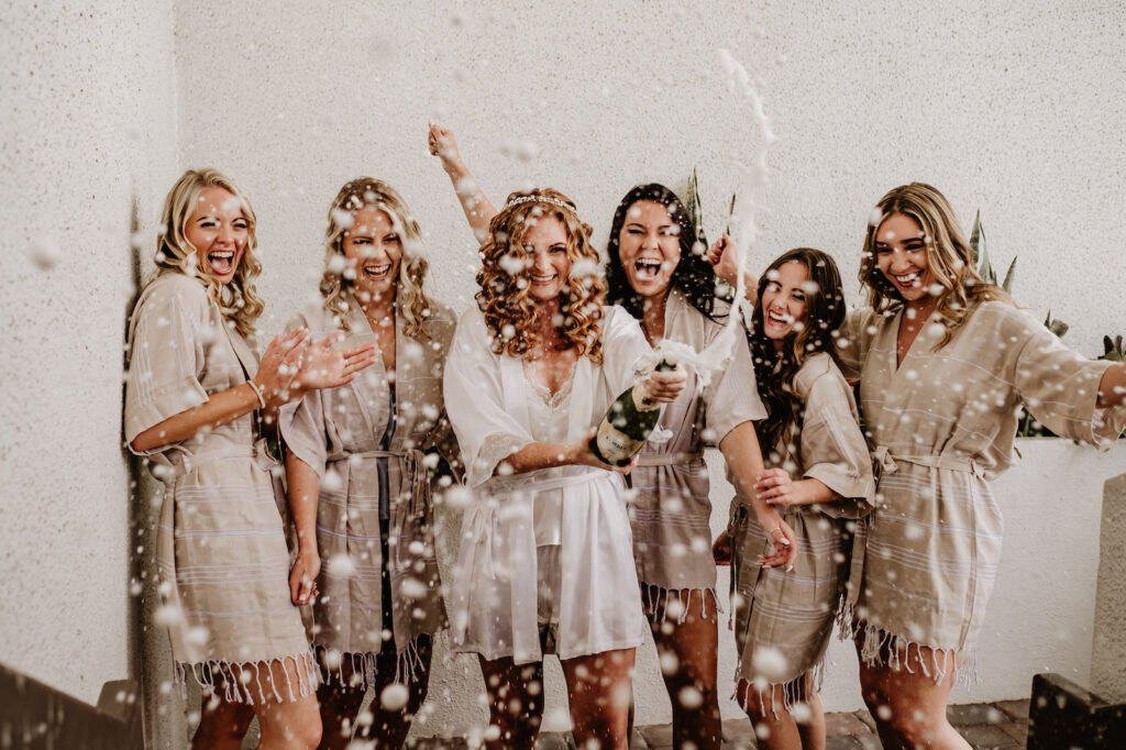 Guests celebrating at the covered oceanfront deck reception at Hilton Clearwater Beach Resort and Spa