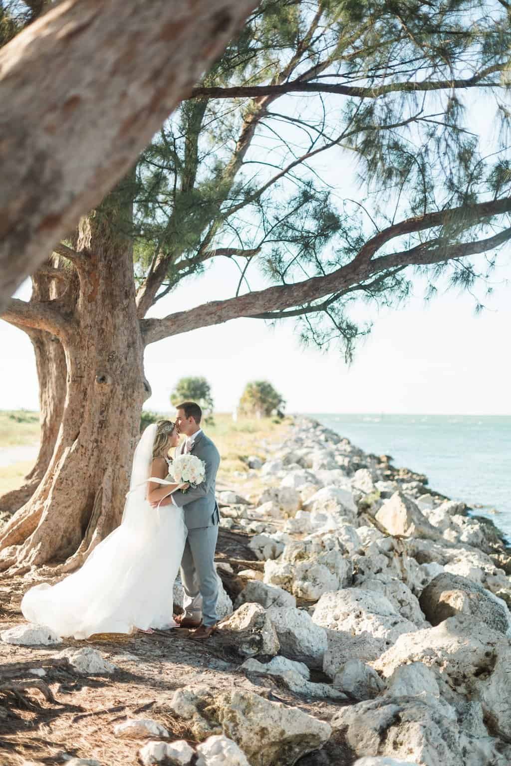 Bride and Groom Beachside Sunset Portrait on Clearwater Beach by K&K Photography
