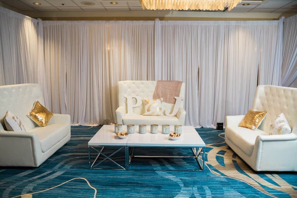 Opulent White Tufted Lounge Furniture Vignette and Perimeter Draping by Gabro Event Services