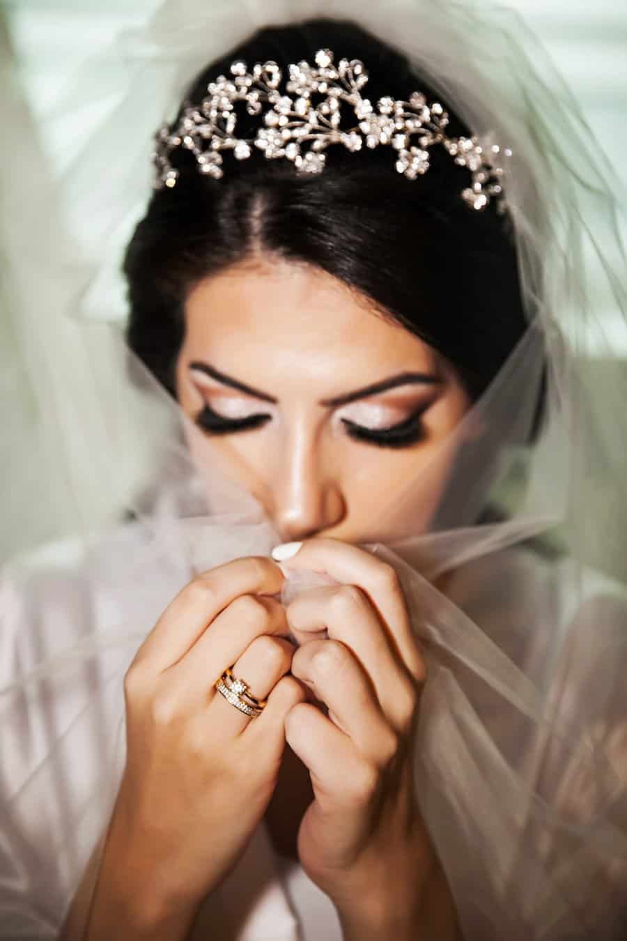 Indian Bridal Beauty Portrait with Dramatic Eye Makeup and Embroidered Veil