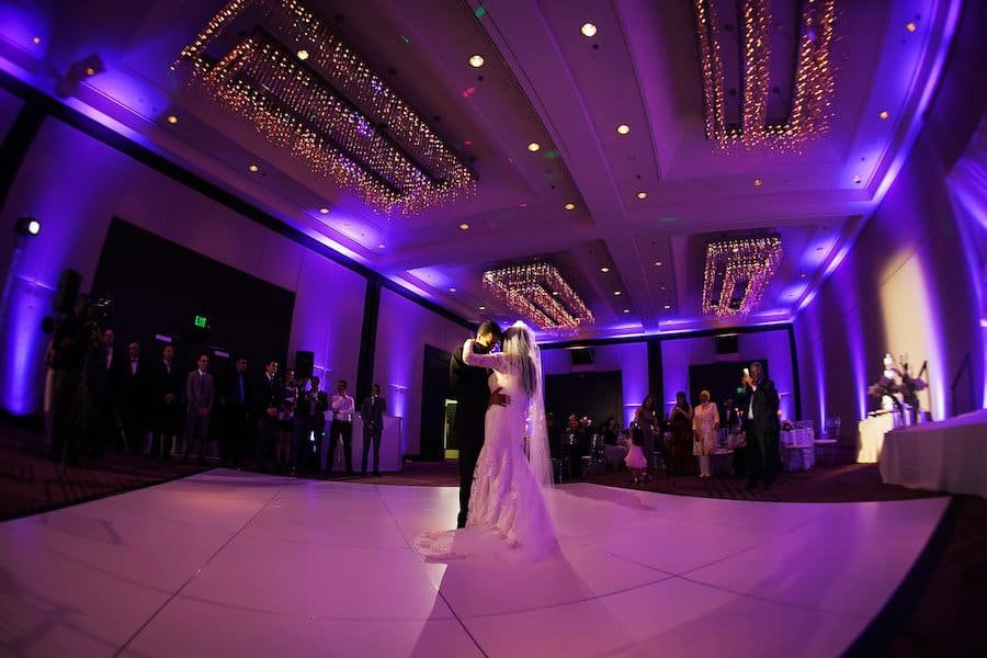 Bride and Groom Emotional First Dance on the Ballroom Dance Floor