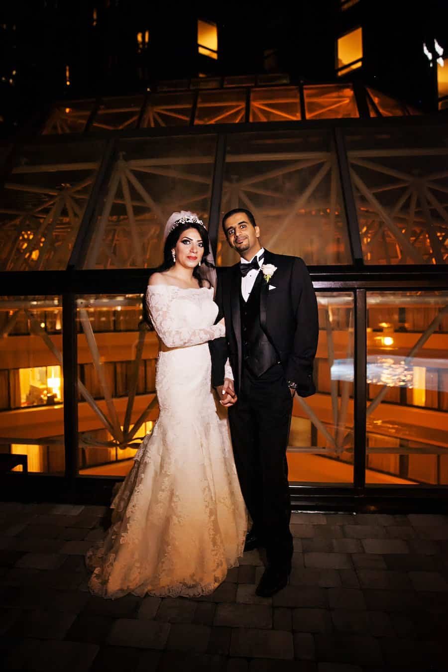 Nighttime Bride and Groom Cityscape Portrait in Downtown Tampa