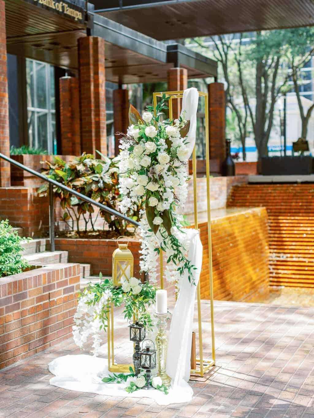 Downtown Tampa hotel ballroom featuring sleek high-gloss dance floor and tailored fabric draping by Gabro Event Services