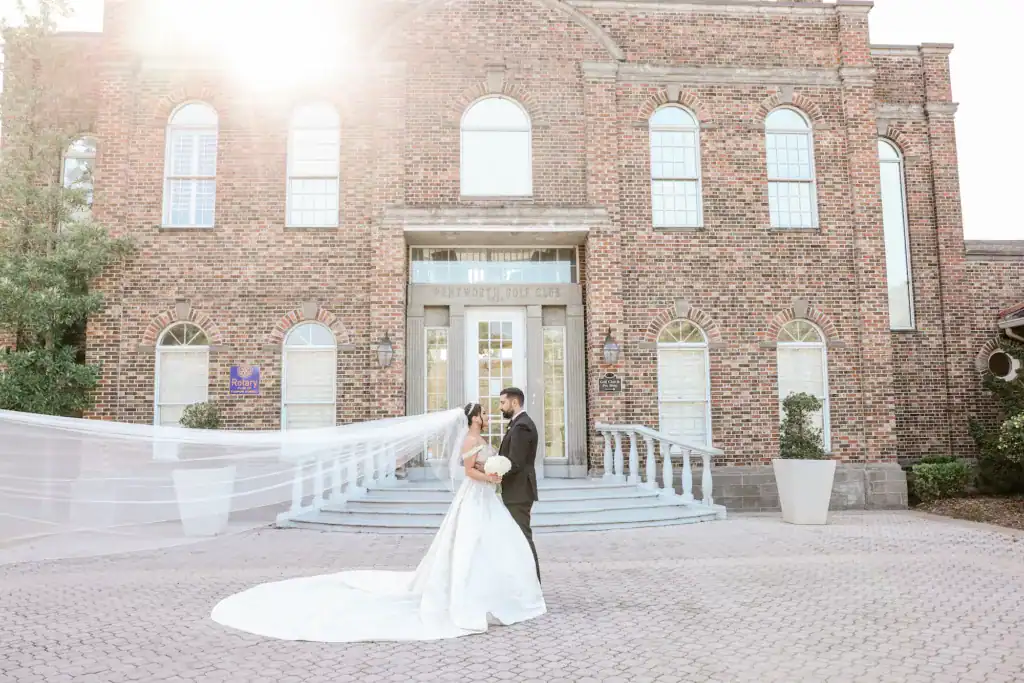 Bride and groom recessional at St. Athanasius Syriac Orthodox Church wedding ceremony in Tampa