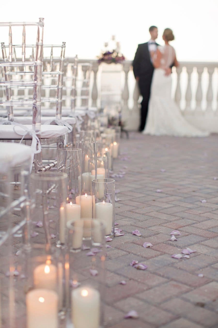 Rooftop Aisle Setup with Clear Chiavari Chairs and Candle Lanterns by Gabro Event Services
