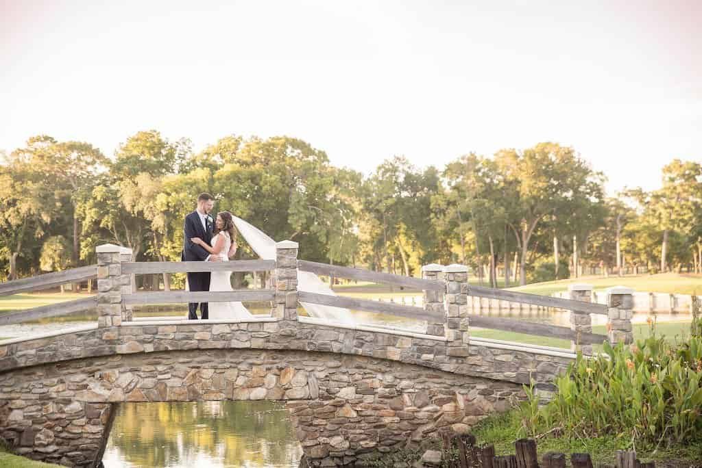 Bride and Groom Sunset Wedding Portrait on the Wooden Bridge at Innisbrook Golf and Spa Resort in Palm Harbor