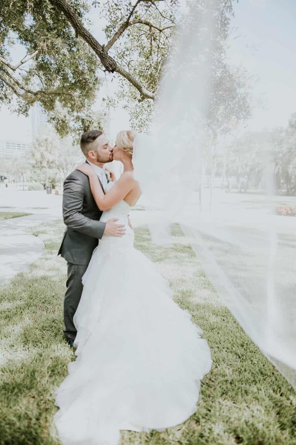 Bride and Groom Waterfront Wedding Portrait on the Tampa Riverwalk Boardwalk by Richard Harrell Photography