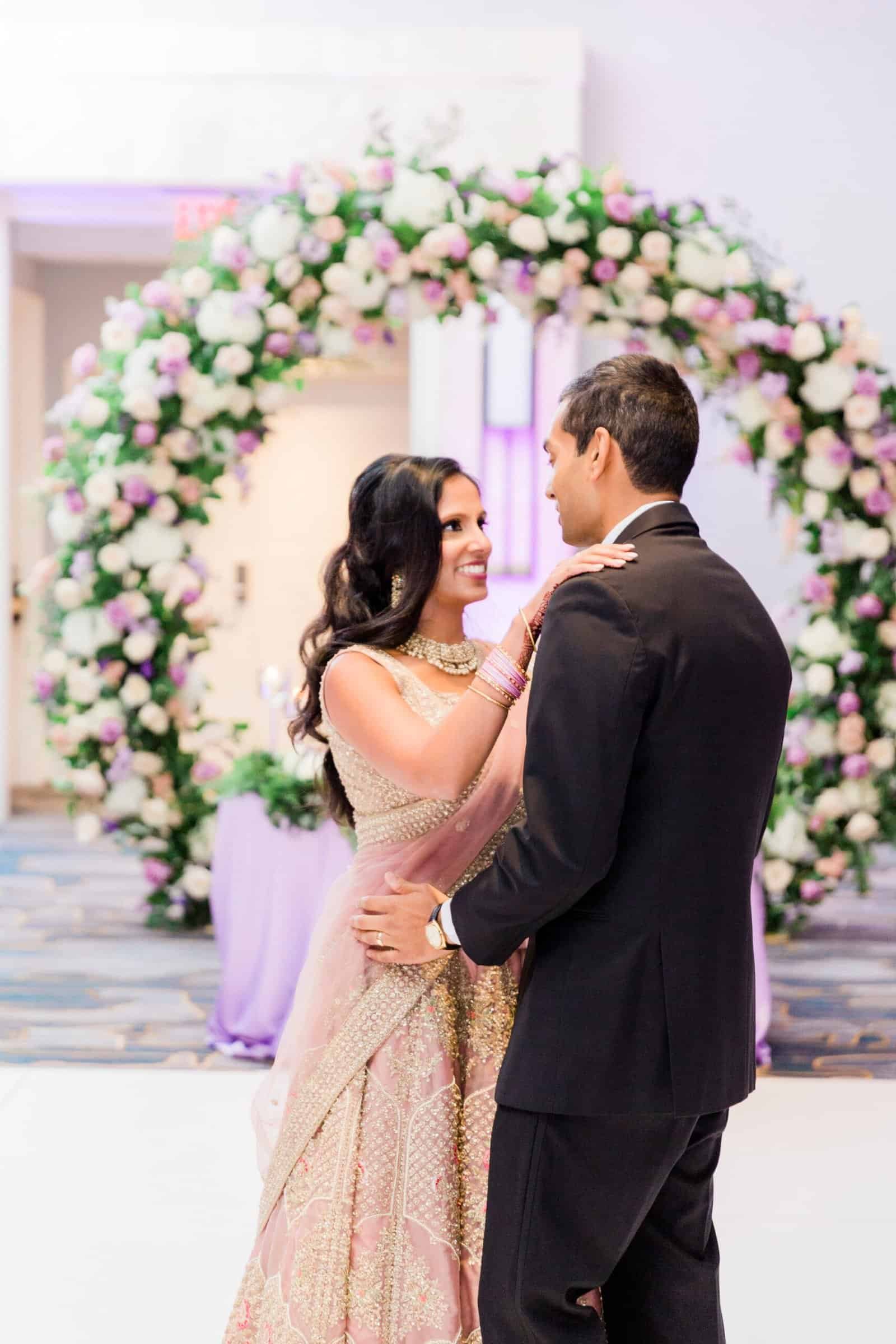 Samira and Samir sharing a romantic first look moment before their ceremony.