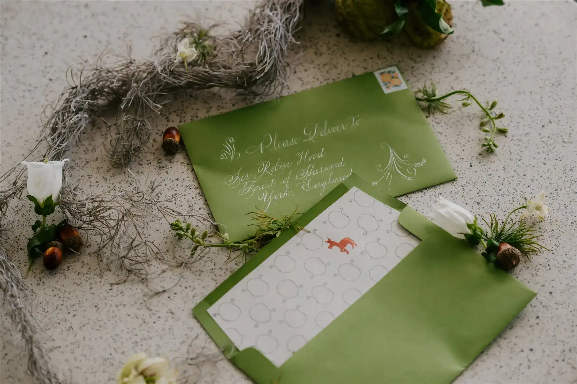 Enchanted woodland lounge and cocktail seating area surrounded by natural Florida greenery