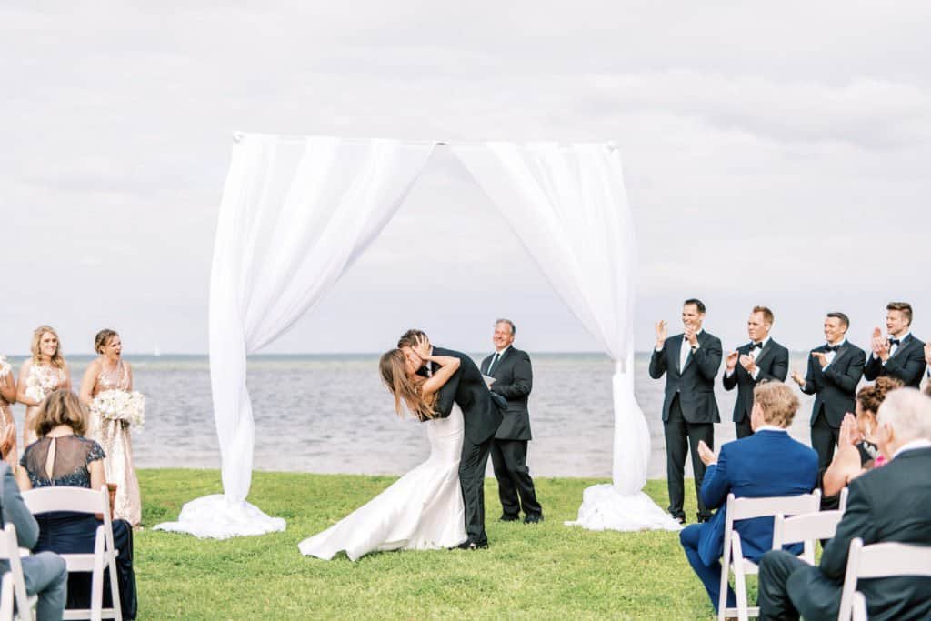 Ceremony draped arch on the lawn at Morean Center for Clay