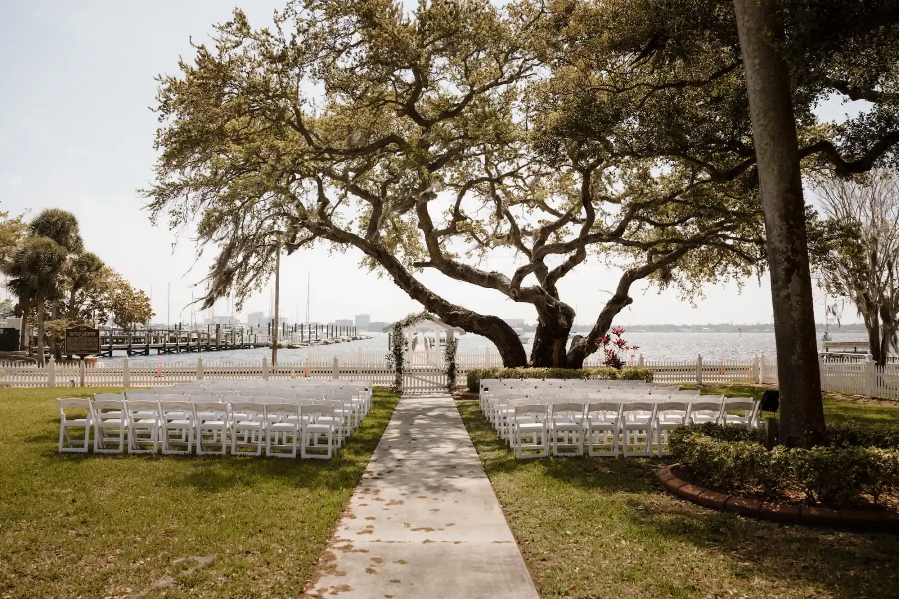 Classic white and greenery outdoor wedding ceremony at Palmetto Riverside B&B