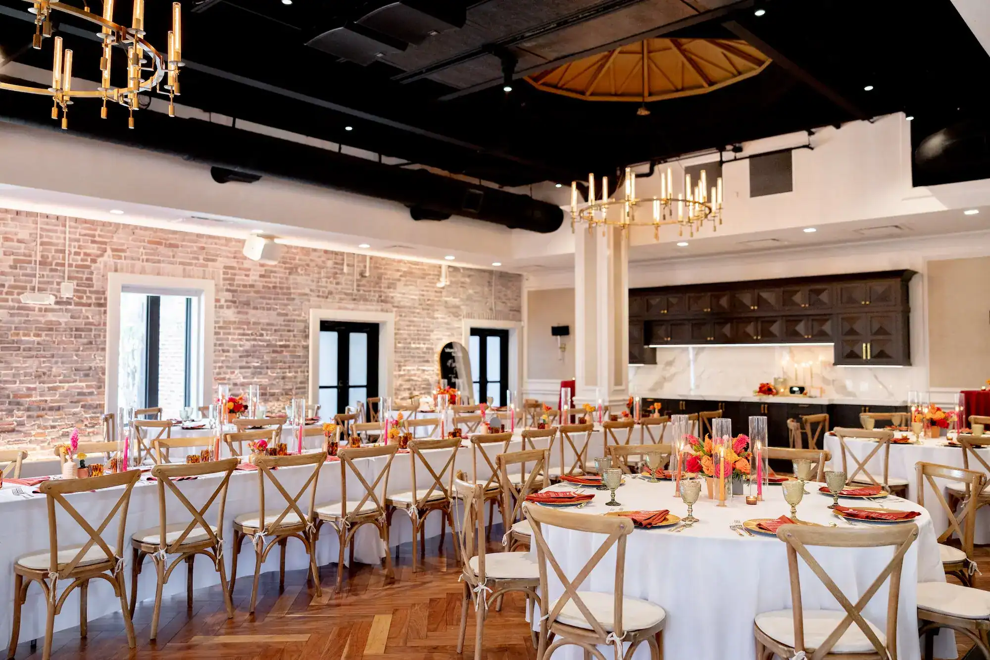 Southwestern Inspired Wedding Reception Layout with Banquet Tables and Brick Accent Walls