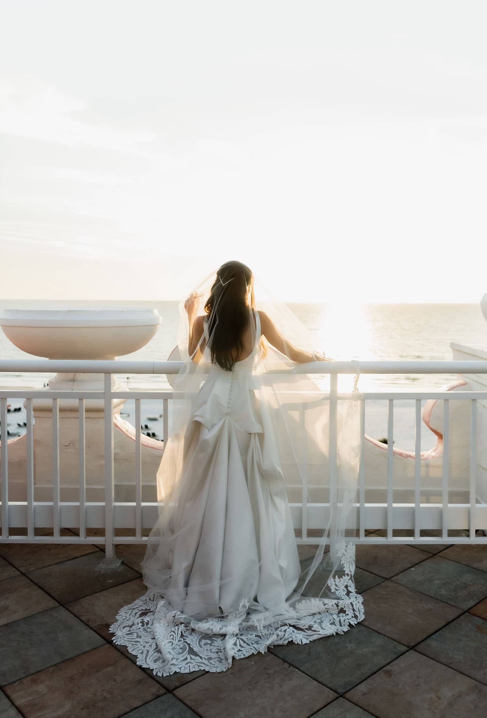 Newlyweds Sharing an Emotional First Dance in the Wyndham Grand Ballroom with Ambient Mood Lighting