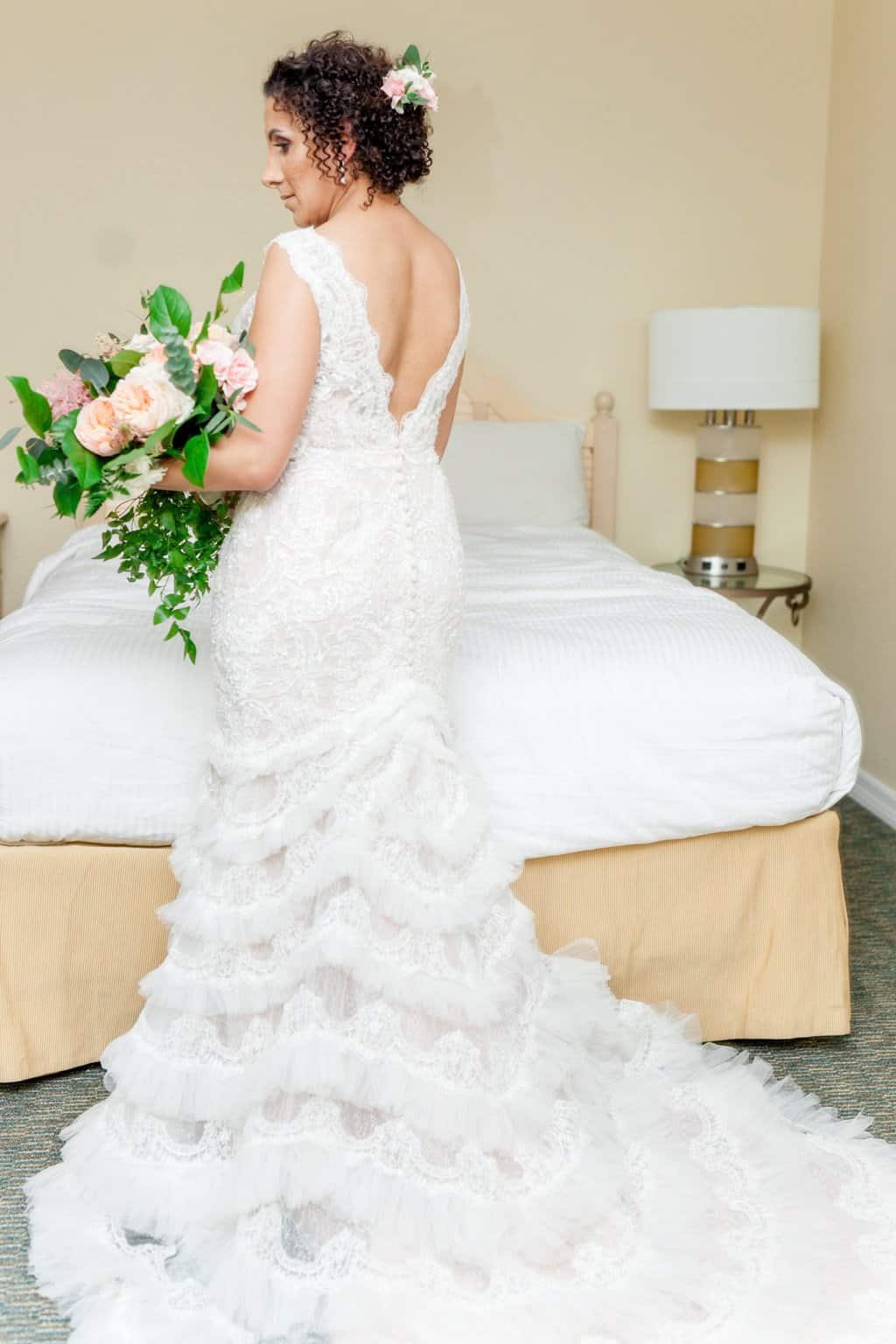 Bride in Custom Lace Fringe Gown with Lush Peach Garden Rose Bouquet by Cotton and Magnolia