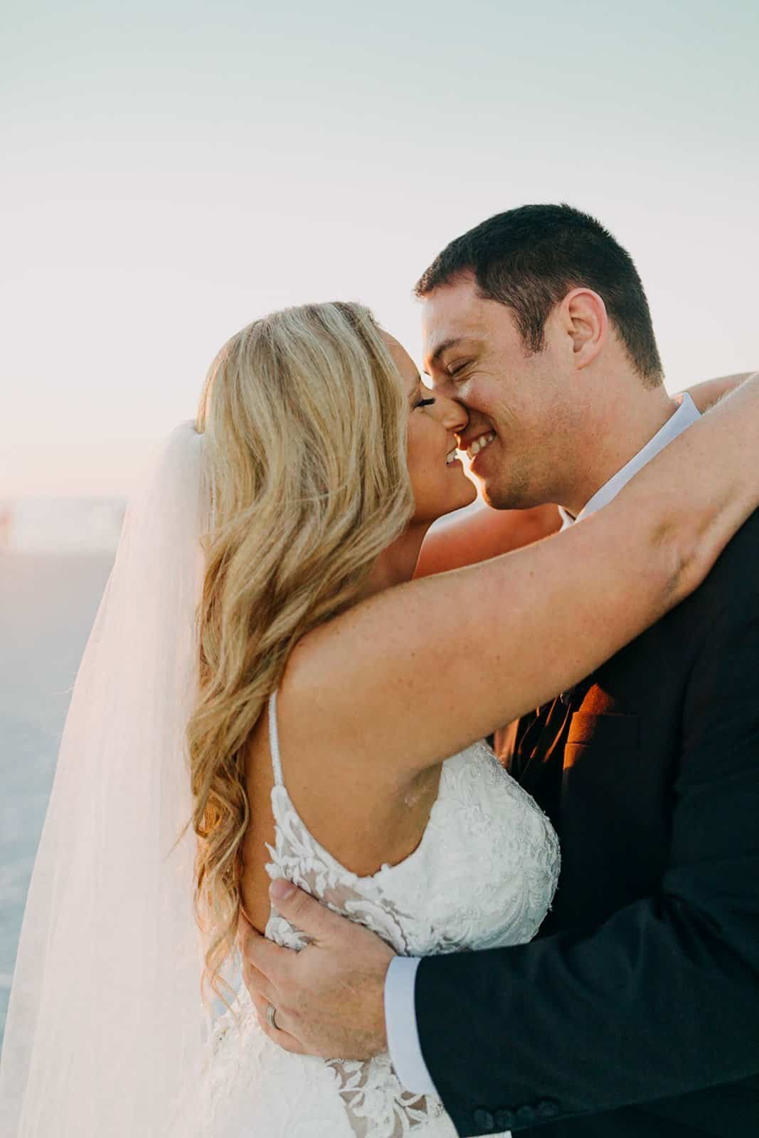 Romantic Beach Sunset Kiss on the Gulf Waters by Amber McWhorter Photography