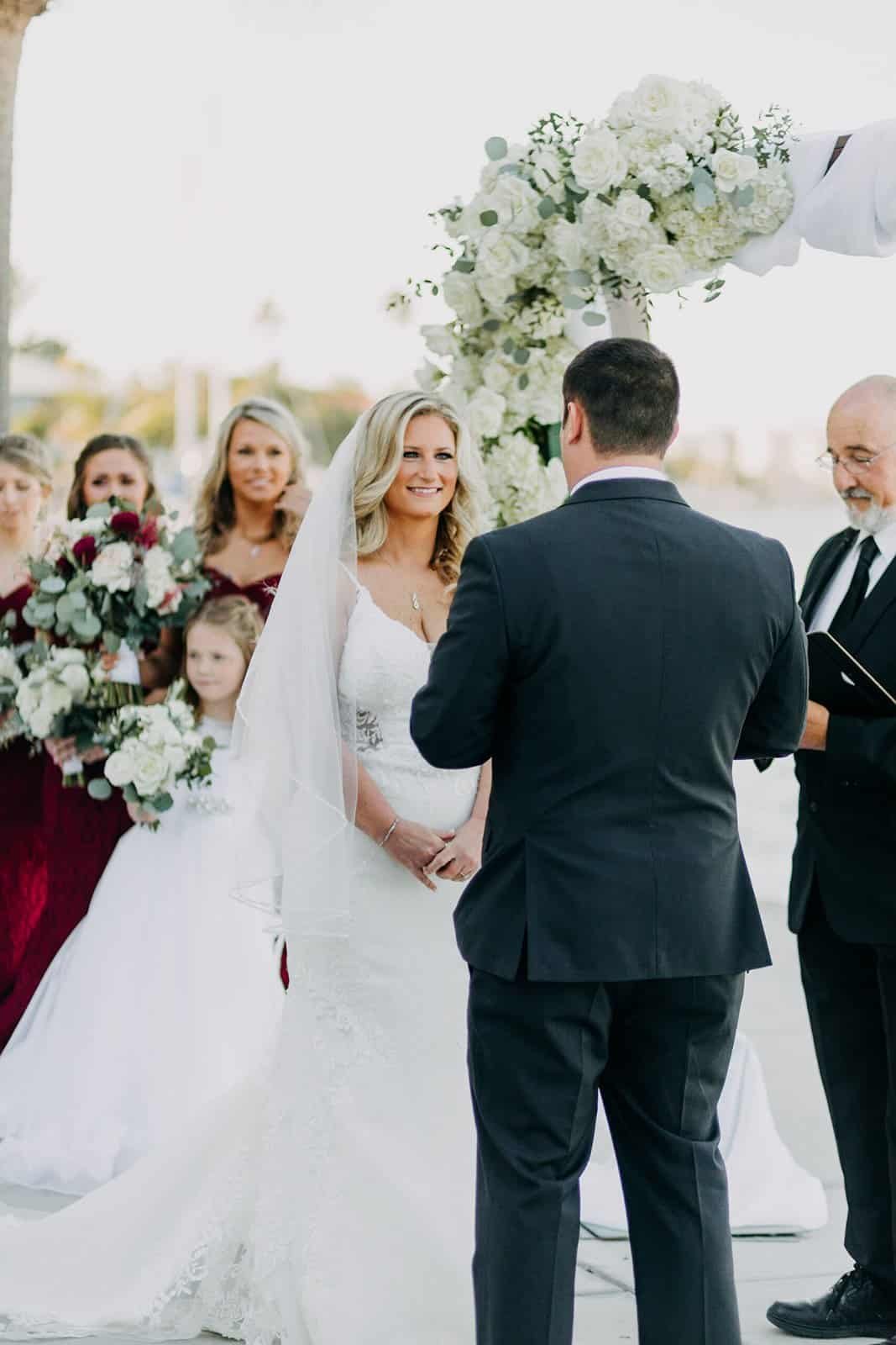 Guests holding sparklers to form a glowing aisle for the couple's exit.