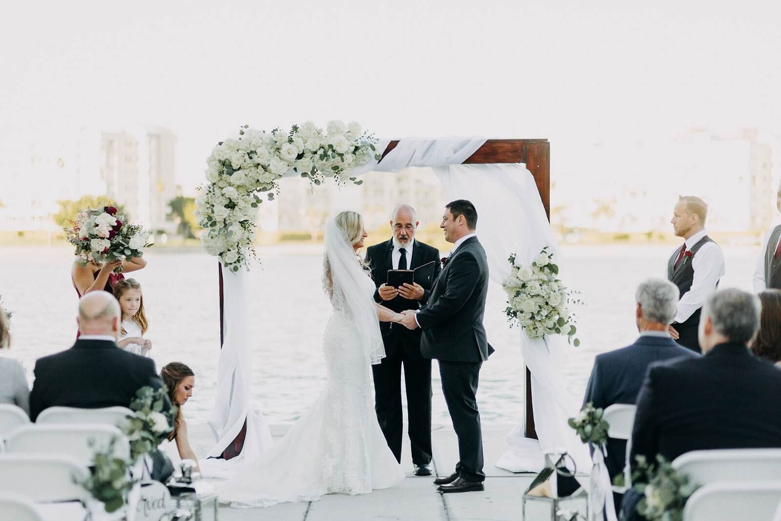 Sky terrace ceremony with draped arbor overlooking Clearwater Beach and the Gulf