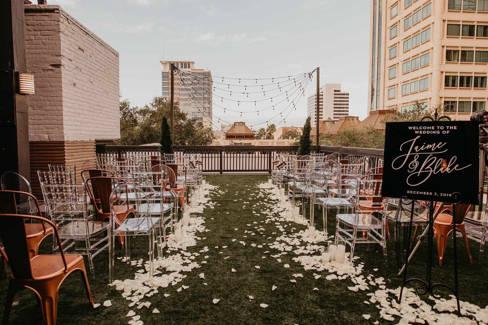 A panoramic view of a lush rooftop wedding ceremony in downtown St. Petersburg.