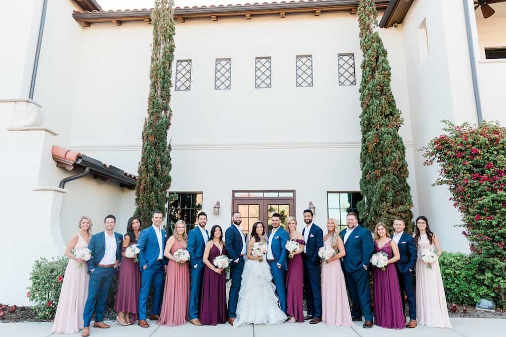 Bride and Groom Tropical Garden Wedding Portrait Among Giant Palm Fronds at Sunken Gardens