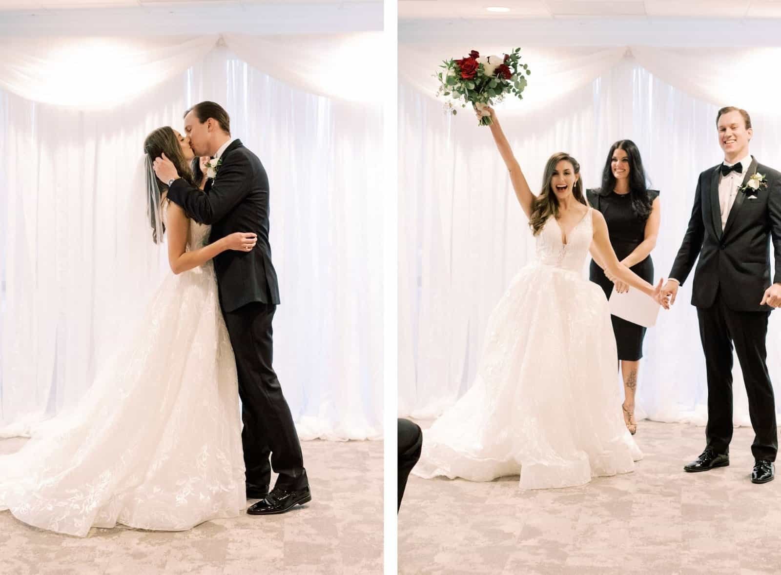 Bride and groom sharing first kiss in front of white chiffon ceremonial draping at The Tampa Club