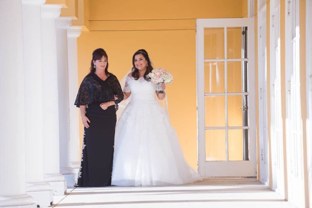 An elegant lakeside wedding ceremony setup at Tampa Palms Golf and Country Club.