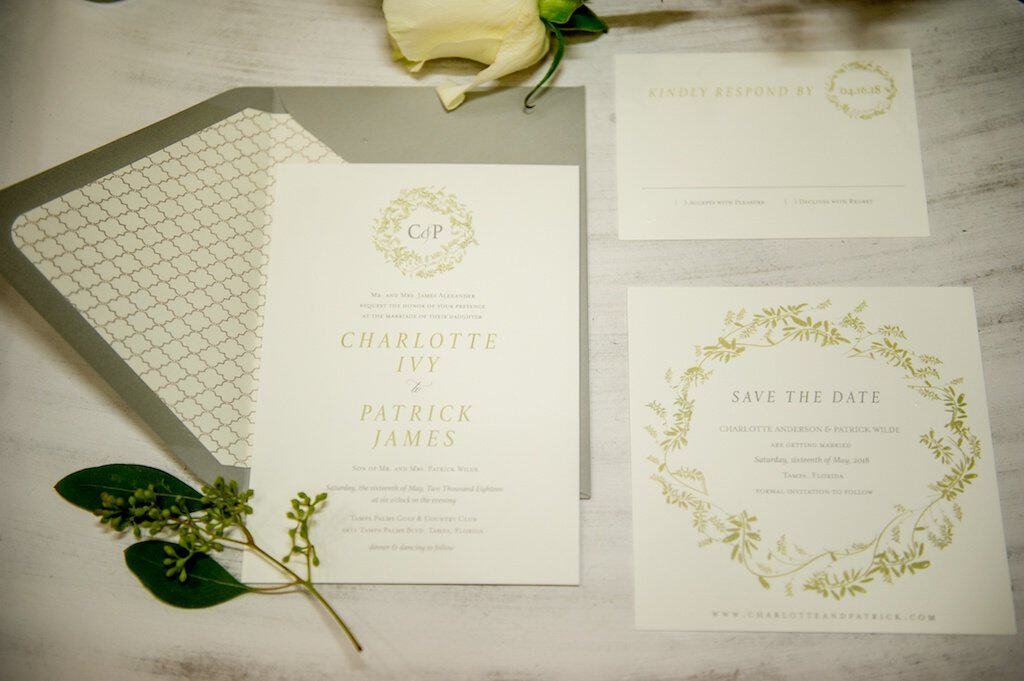 Southern style veranda wedding reception with mahogany Chiavari chairs, romantic greenery, and floral centerpieces