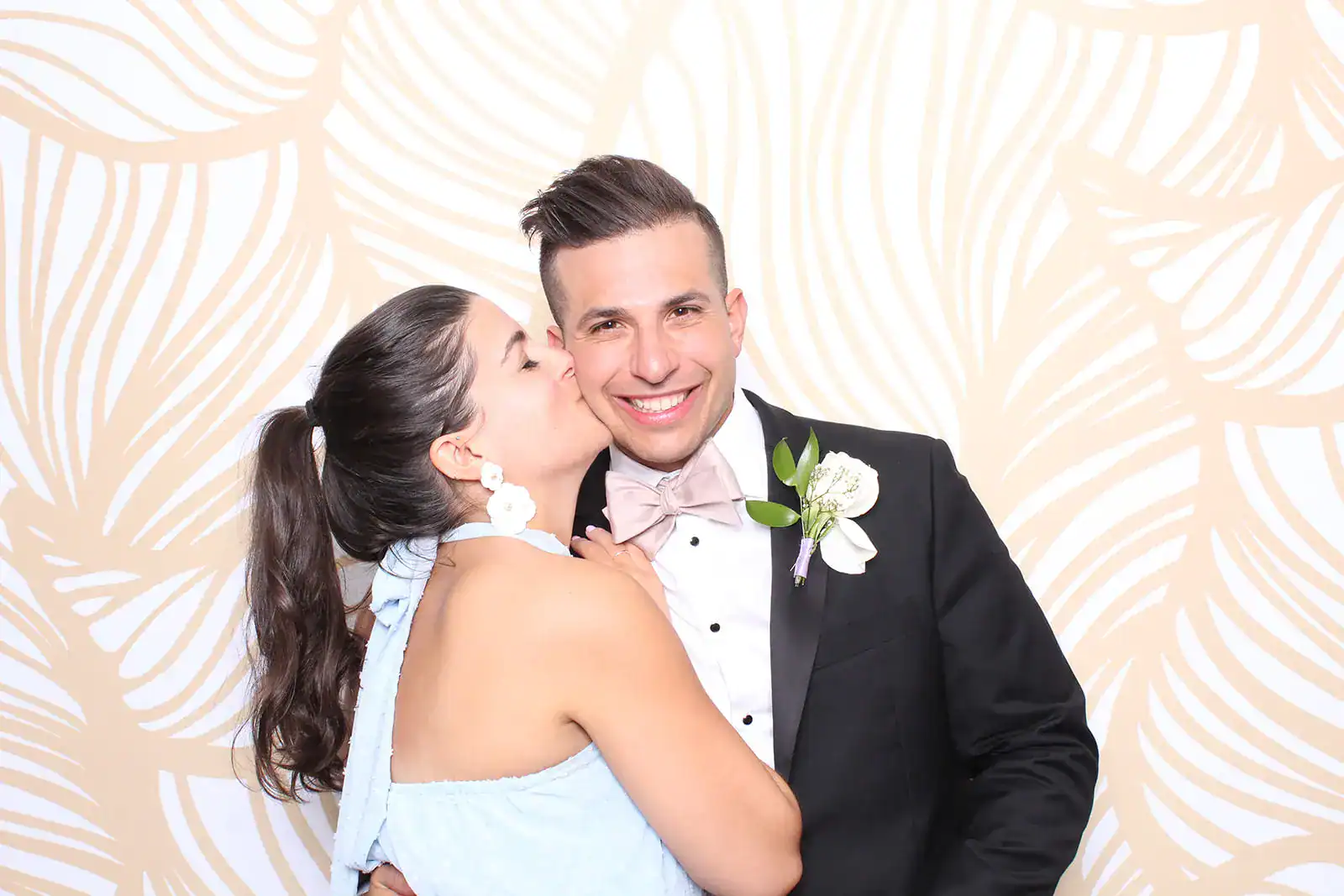 A beautiful wedding reception at The Orlo featuring purple flowers and wooden accents.