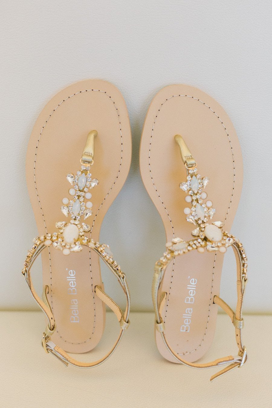 Fashion-forward bridal styling with modern textured gown and sleek bridal party aesthetic inside The Tampa Club