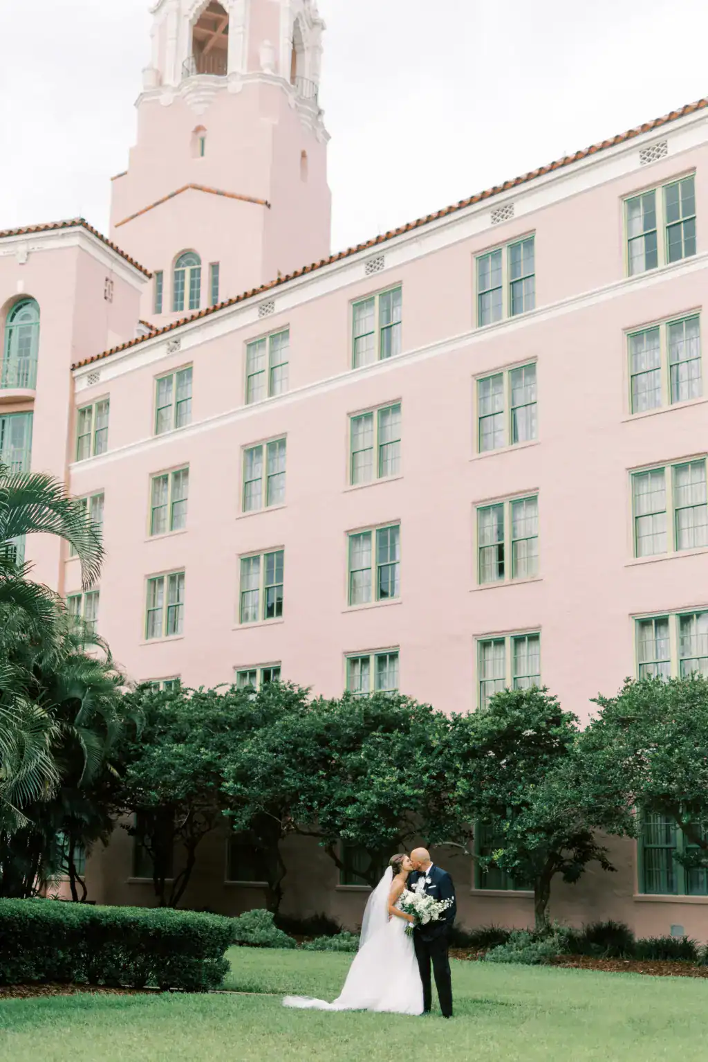 Katy and Cole outdoor courtyard wedding portrait on the iconic Vinoy Esplanade in St. Petersburg