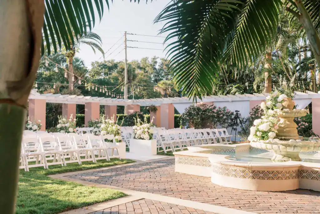 Outdoor Old Florida Tea Garden wedding ceremony setup at The Vinoy in St Petersburg