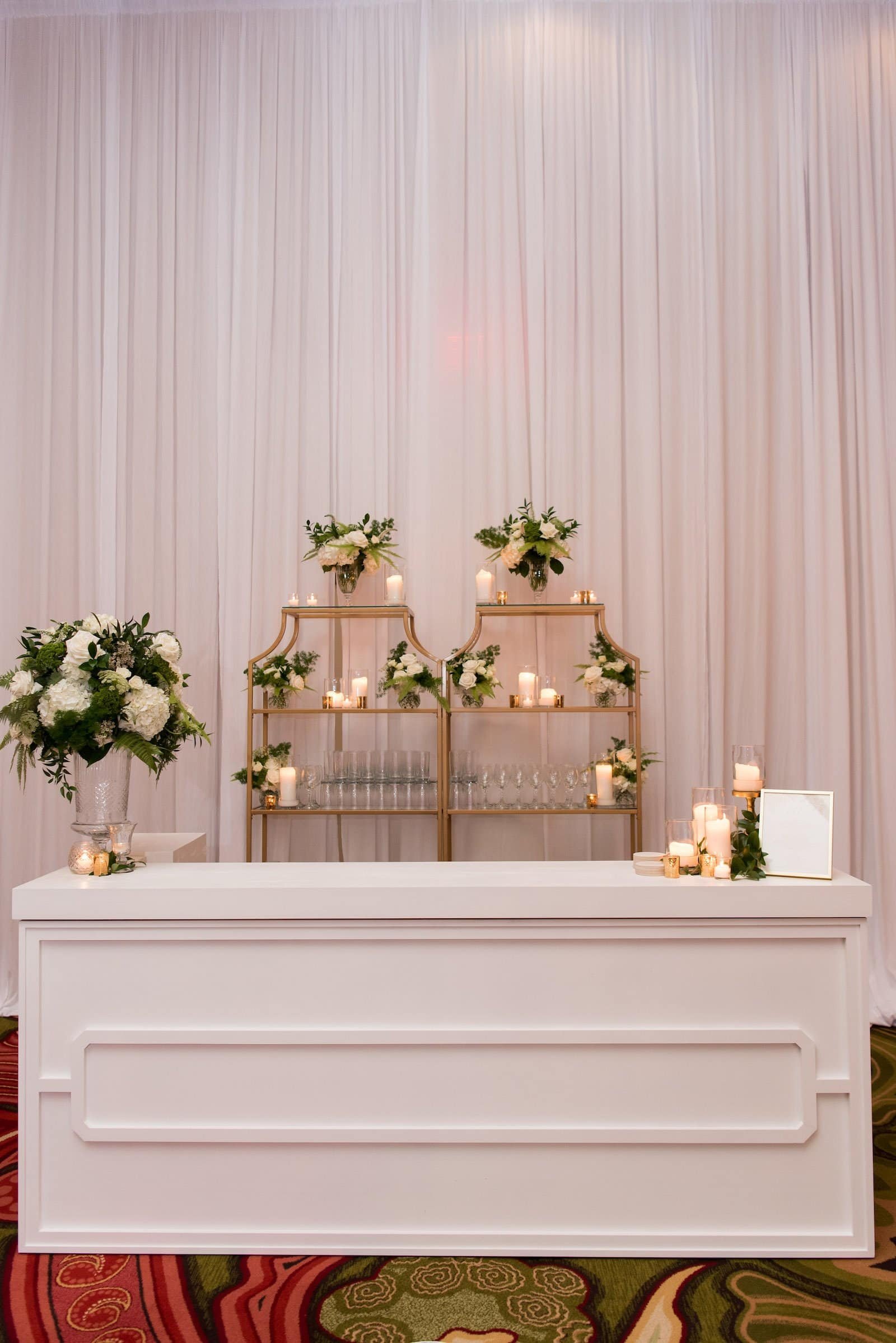 Custom White Bar and Gold Shelving Display with Florals in Vinoy Ballroom